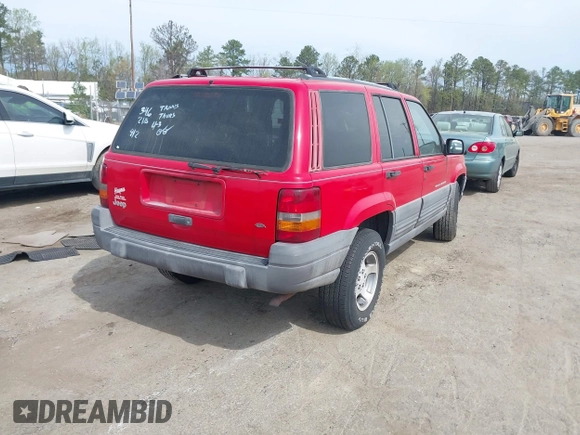 1996 Jeep Grand Cherokee Laredo with VIN 1J4FX58S4TC346218, listed as a IAAI auction lot 41943268 with 138,431 mi miles and . Bid and sale history available at DreamBid. Image 4.