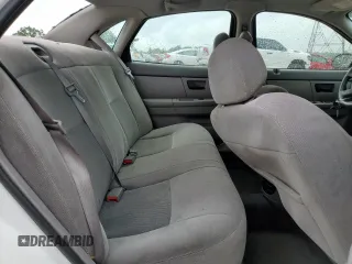 2007 Ford Taurus SE z VIN 1FAFP53U87A138588, wystawiony jako Copart lot #56965245 z przebiegiem Nie podano mil oraz Szkoda całkowita • Salvage title. Historia ofert i sprzedaży dostępna na DreamBid. Obrazek 10.