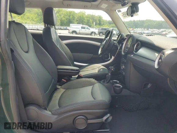 2011 MINI Hardtop with VIN WMWSU3C51BTX95581, listed as a Copart auction lot 60443995 with 157,213 mi miles and Salvage title. Bid and sale history available at DreamBid. Image 10.