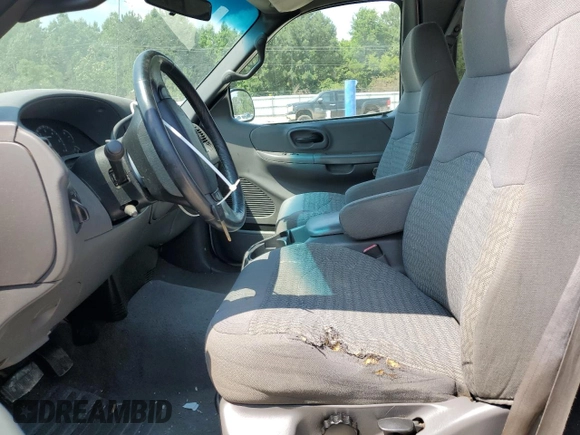 2000 Ford F-150 XL z VIN 1FTRX18L0YNA65615, wystawiony jako Copart lot #58508375 z przebiegiem Nie podano mil oraz Szkoda całkowita • Salvage title. Historia ofert i sprzedaży dostępna na DreamBid. Obrazek 7.