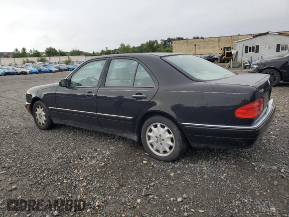 1999 Mercedes-Benz E-Class with VIN WDBJF65H9XA929577, listed as a Copart auction lot 71932364 with 84,806 mi miles and Salvage Title. Bid and sale history available at carsss.com. Image 2.