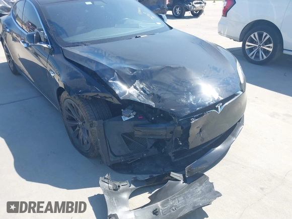 2020 Tesla Model S Long Range with VIN 5YJSA1E27LF397346, listed as a IAAI auction lot 40579015 with 43,779 mi miles and . Bid and sale history available at DreamBid. Image 6.