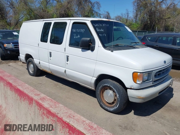 1999 Ford Econoline Cargo with VIN 1FTRE1421XHB21609, listed as a IAAI auction lot 42070347 with 103,104 mi miles. Bid and sale history available at carsss.com. Image 1.