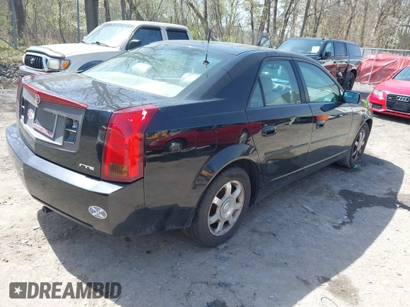 2003 Cadillac CTS with VIN 1G6DM57N430125143, listed as a IAAI auction lot 42142953 with 85,913 mi miles. Bid and sale history available at carsss.com. Image 4.