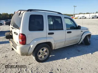 2004 Jeep Liberty Limited with VIN 1J4GK58K34W298410, listed as a Copart auction lot 76970054 with 269,999 mi miles and Salvage title. Bid and sale history available at DreamBid. Image 3.