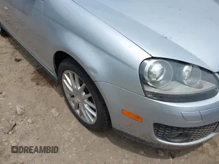 2006 Volkswagen Jetta GLI Turbo z VIN 3VWXJ71K06M728828, wystawiony jako IAAI lot #42477114 z przebiegiem 95 238 mil mil oraz . Historia ofert i sprzedaży dostępna na DreamBid. Obrazek 6.