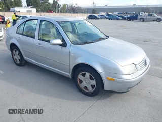 1999 Volkswagen Jetta z VIN 3VWSC29M9XM067508, wystawiony jako IAAI lot #41905002 z przebiegiem 32 051 mil mil oraz . Historia ofert i sprzedaży dostępna na DreamBid. Obrazek 1.