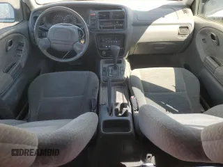 2003 Suzuki Vitara z VIN 2S3TE52V936103533, wystawiony jako Copart lot #55297135 z przebiegiem 122 230 mil mil oraz Szkody całkowita. Historia ofert i sprzedaży dostępna na DreamBid. Obrazek 8.