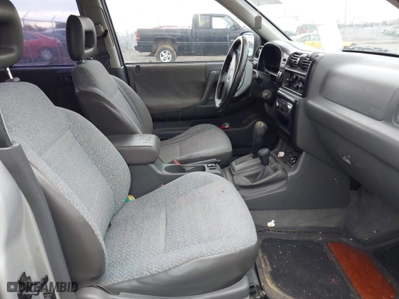 1998 Isuzu Rodeo S with VIN 4S2CM58W6W4375632, listed as a IAAI auction lot 41659797 with 195,732 mi miles. Bid and sale history available at carsss.com. Image 5.