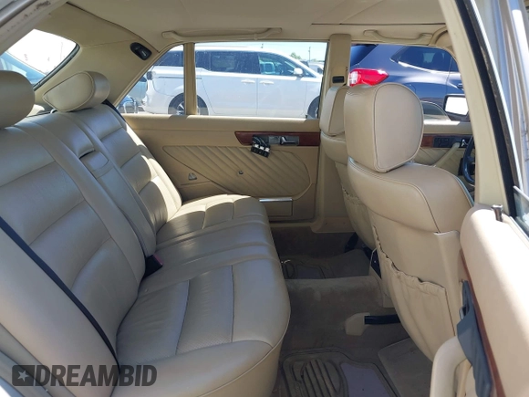 1989 Mercedes-Benz 560 with VIN WDBCA39D7KA436793, listed as a IAAI auction lot 42190980 with 141,165 mi miles and . Bid and sale history available at DreamBid. Image 8.