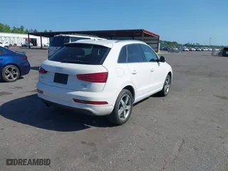 2015 Audi Q3 2.0T Premium Plus with VIN WA1EFCFS7FR010697, listed as a IAAI auction lot 41948566 with 167,001 mi miles. Bid and sale history available at carsss.com. Image 4.