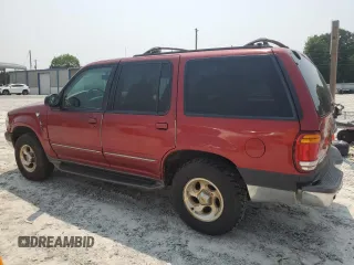2000 Ford Explorer XLT with VIN 1FMZU73E4YZA72348, listed as a Copart auction lot 59015585 with 182,606 mi miles and Salvage title. Bid and sale history available at DreamBid. Image 2.