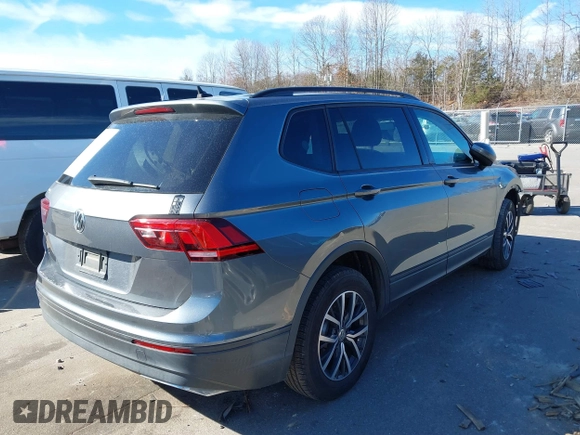 2021 Volkswagen Tiguan S with VIN 3VV1B7AX1MM044788, listed as a IAAI auction lot 41678069 with 91,665 mi miles and . Bid and sale history available at DreamBid. Image 4.