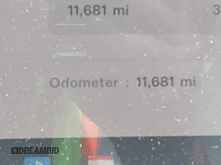 2025 Tesla Model 3 Long Range z VIN 5YJ3E1EB6SF874419, wystawiony jako IAAI lot #42422443 z przebiegiem 11 681 mil mil oraz . Historia ofert i sprzedaży dostępna na DreamBid. Obrazek 7.