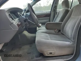 2004 Mercury Grand Marquis GS z VIN 2MEFM74W84X607050, wystawiony jako Copart lot #52303045 z przebiegiem 194 215 mil mil oraz Szkoda całkowita • Salvage title. Historia ofert i sprzedaży dostępna na DreamBid. Obrazek 7.