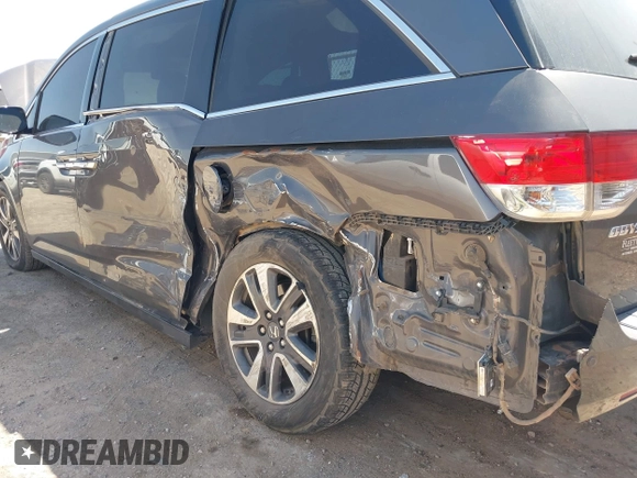 2015 Honda Odyssey Touring Elite with VIN 5FNRL5H98FB034700, listed as a IAAI auction lot 42019265 with 226,829 mi miles and . Bid and sale history available at DreamBid. Image 6.