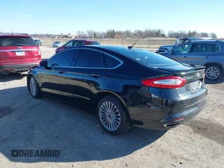 2016 Ford Fusion Titanium with VIN 3FA6P0K95GR135766, listed as a IAAI auction lot 41735040 with 99,256 mi miles. Bid and sale history available at carsss.com. Image 3.