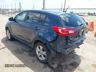 2013 Kia Sportage LX with VIN KNDPB3A22D7399775, listed as a IAAI auction lot 42358930 with 102,280 mi miles and . Bid and sale history available at DreamBid. Image 3.