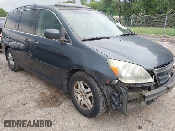 2006 Honda Odyssey EX-L z VIN 5FNRL38756B420817, wystawiony jako IAAI lot #42101271 z przebiegiem 203 892 mil mil oraz . Historia ofert i sprzedaży dostępna na DreamBid. Obrazek 1.