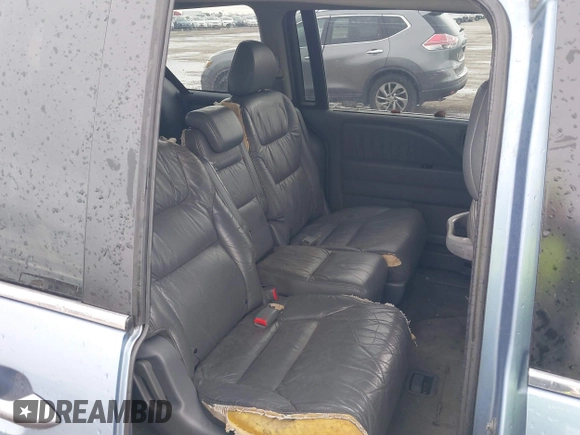 2007 Honda Odyssey EX-L z VIN 5FNRL38647B139018, wystawiony jako IAAI lot #41712602 z przebiegiem 243 473 mil mil oraz . Historia ofert i sprzedaży dostępna na DreamBid. Obrazek 8.