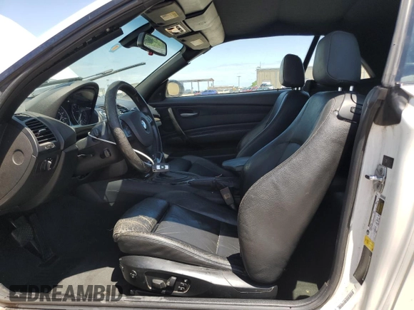 2009 BMW 1 Series 135i with VIN WBAUN93599VK40210, listed as a Copart auction lot 54166905 with 148,899 mi miles and Salvage title. Bid and sale history available at DreamBid. Image 7.