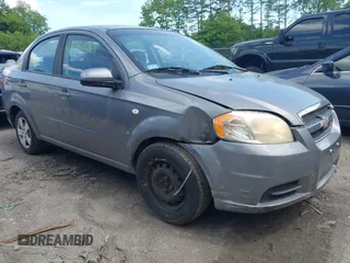 2007 Chevrolet Aveo LS z VIN KL1TD56687B061158, wystawiony jako IAAI lot #42360261 z przebiegiem 74 079 mil mil oraz . Historia ofert i sprzedaży dostępna na DreamBid. Obrazek 1.
