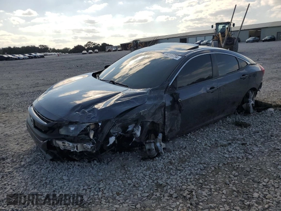2020 Honda Civic Sedan EX-L with VIN 19XFC1F7XLE021851, listed as a Copart auction lot 68318734 with 74,519 mi miles and Salvage Title. Bid and sale history available at carsss.com. Image 1.