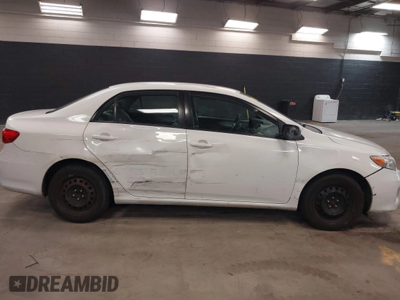 2012 Toyota Corolla L with VIN 2T1BU4EE2CC855849, listed as a IAAI auction lot 42040963 with 156,639 mi miles. Bid and sale history available at carsss.com. Image 6.