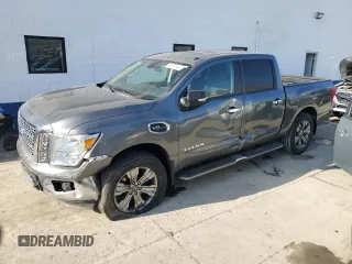 2017 Nissan Titan Platinum Reserve z VIN 1N6AA1E51HN532333, wystawiony jako Copart lot #83570144 z przebiegiem 118 139 mil mil oraz Szkoda całkowita • Salvage title. Historia ofert i sprzedaży dostępna na DreamBid. Obrazek 1.