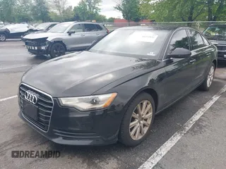 2015 Audi A6 Premium Plus z VIN WAUGFAFC6FN028169, wystawiony jako IAAI lot #42273931 z przebiegiem 100 056 mil mil oraz . Historia ofert i sprzedaży dostępna na DreamBid. Obrazek 2.