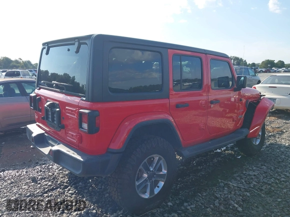 2020 Jeep Wrangler Unlimited Sahara High Altitude with VIN 1C4HJXEG2LW182641, listed as a IAAI auction lot 40130890 with 79,984 mi miles and . Bid and sale history available at DreamBid. Image 4.