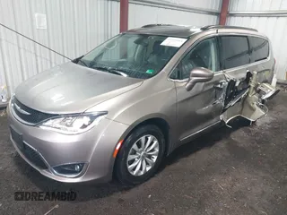 2017 Chrysler Pacifica Touring L with VIN 2C4RC1BG5HR565540, listed as a IAAI auction lot 41999464 with 110,056 mi miles and . Bid and sale history available at DreamBid. Image 2.