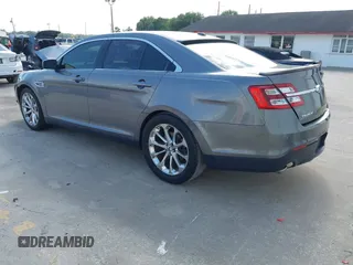 2014 Ford Taurus Limited with VIN 1FAHP2F89EG102814, listed as a IAAI auction lot 41999304 with 254,644 mi miles. Bid and sale history available at carsss.com. Image 3.