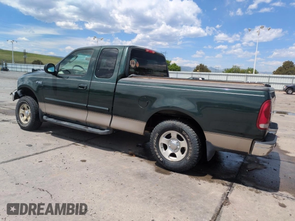 2003 Ford F-150 XL with VIN 2FTRX172X3CA58789, listed as a Copart auction lot 57986695 with 160,124 mi miles and Salvage title. Bid and sale history available at DreamBid. Image 2.