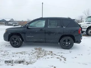 2016 Jeep Compass High Altitude z VIN 1C4NJDEB8GD758174, wystawiony jako IAAI lot #41235089 z przebiegiem 144 841 mil mil oraz . Historia ofert i sprzedaży dostępna na DreamBid. Obrazek 14.
