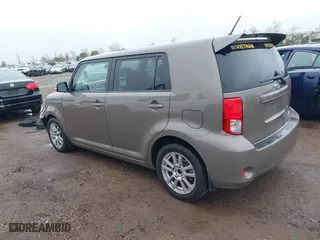 2011 Scion xB with VIN JTLZE4FE9B1141752, listed as a IAAI auction lot 41797088 with 114,357 mi miles. Bid and sale history available at carsss.com. Image 3.