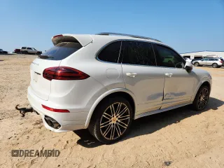2015 Porsche Cayenne S with VIN WP1AB2A24FLA59813, listed as a Copart auction lot 60604305 with 137,719 mi miles and Salvage title. Bid and sale history available at DreamBid. Image 3.