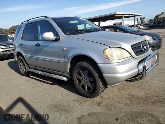 2000 Mercedes-Benz M 320/430/500 with VIN 4JGAB72E2YA185234, listed as a Copart auction lot 83479684 with 209,491 mi miles and Clean title. Bid and sale history available at DreamBid. Image 4.
