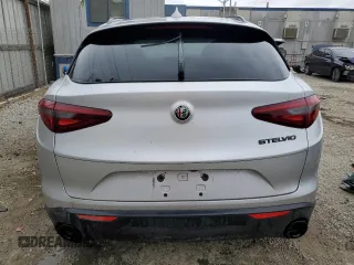 2019 Alfa Romeo Stelvio z VIN ZASPAJAN0K7C71850, wystawiony jako Copart lot #54234205 z przebiegiem Nie podano mil oraz Szkoda całkowita • Salvage title. Historia ofert i sprzedaży dostępna na DreamBid. Obrazek 6.