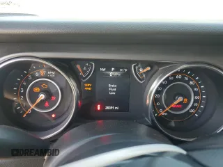 2021 Jeep Wrangler Unlimited Sport S with VIN 1C4HJXDG1MW730308, listed as a Copart auction lot 56921685 with 28,391 mi miles and Salvage title. Bid and sale history available at DreamBid. Image 9.