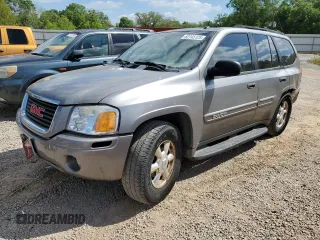 2005 GMC Envoy SLT z VIN 1GKDS13S652344365, wystawiony jako Copart lot #52745125 z przebiegiem 131 099 mil mil oraz Szkoda całkowita • Salvage title. Historia ofert i sprzedaży dostępna na DreamBid. Obrazek 1.