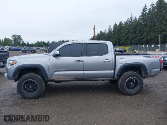 2020 Toyota Tacoma SR5 z VIN 3TMCZ5AN8LM323918, wystawiony jako IAAI lot #42279462 z przebiegiem 105 923 mil mil oraz . Historia ofert i sprzedaży dostępna na DreamBid. Obrazek 14.