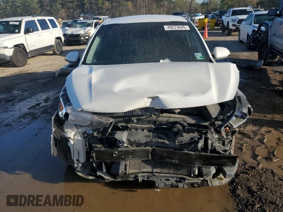 2022 Kia Rio LX with VIN 3KPA24AD3NE479603, listed as a Copart auction lot 49273645 with 67,286 mi miles and Salvage Title. Bid and sale history available at DreamBid. Image 5.
