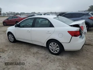 2013 Kia Forte EX with VIN KNAFU4A22D5716233, listed as a Copart auction lot 70716934 with 129,940 mi miles and Salvage Title. Bid and sale history available at carsss.com. Image 2.
