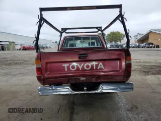 1991 Toyota Pickup DLX с VIN JT4RN93P9M5040575, выставлен на аукционе Copart как лот 58934495 с пробегом 43 376 миль миль и Списание • Salvage title. История ставок и продаж доступна на DreamBid. Изображение 6.