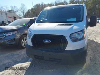 2022 Ford Transit Cargo with VIN 1FTBR2Y84NKA64395, listed as a IAAI auction lot 41359067 with 59,393 mi miles and . Bid and sale history available at DreamBid. Image 12.