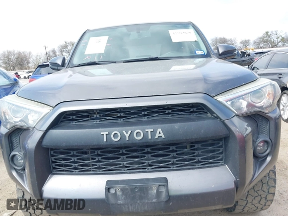 2015 Toyota 4Runner SR5 with VIN JTEZU5JRXF5091016, listed as a IAAI auction lot 41592829 with 196,988 mi miles and . Bid and sale history available at DreamBid. Image 6.
