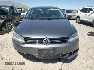 2013 Volkswagen Jetta SE with VIN 3VWDX7AJ3DM271048, listed as a Copart auction lot 59257995 with 122,393 mi miles and Salvage title. Bid and sale history available at DreamBid. Image 5.