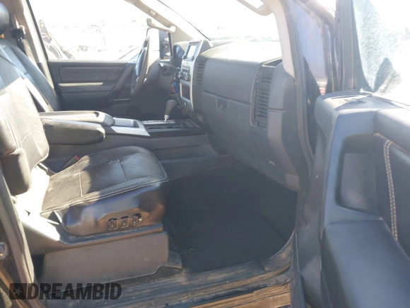 2014 Nissan Titan S with VIN 1N6AA0EC6EN506928, listed as a IAAI auction lot 41380319 with 102,669 mi miles and . Bid and sale history available at DreamBid. Image 5.