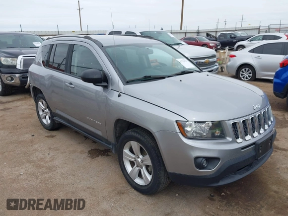 2016 Jeep Compass Sport with VIN 1C4NJDBB8GD780146, listed as a IAAI auction lot 41792416 with 127,548 mi miles. Bid and sale history available at carsss.com. Image 1.